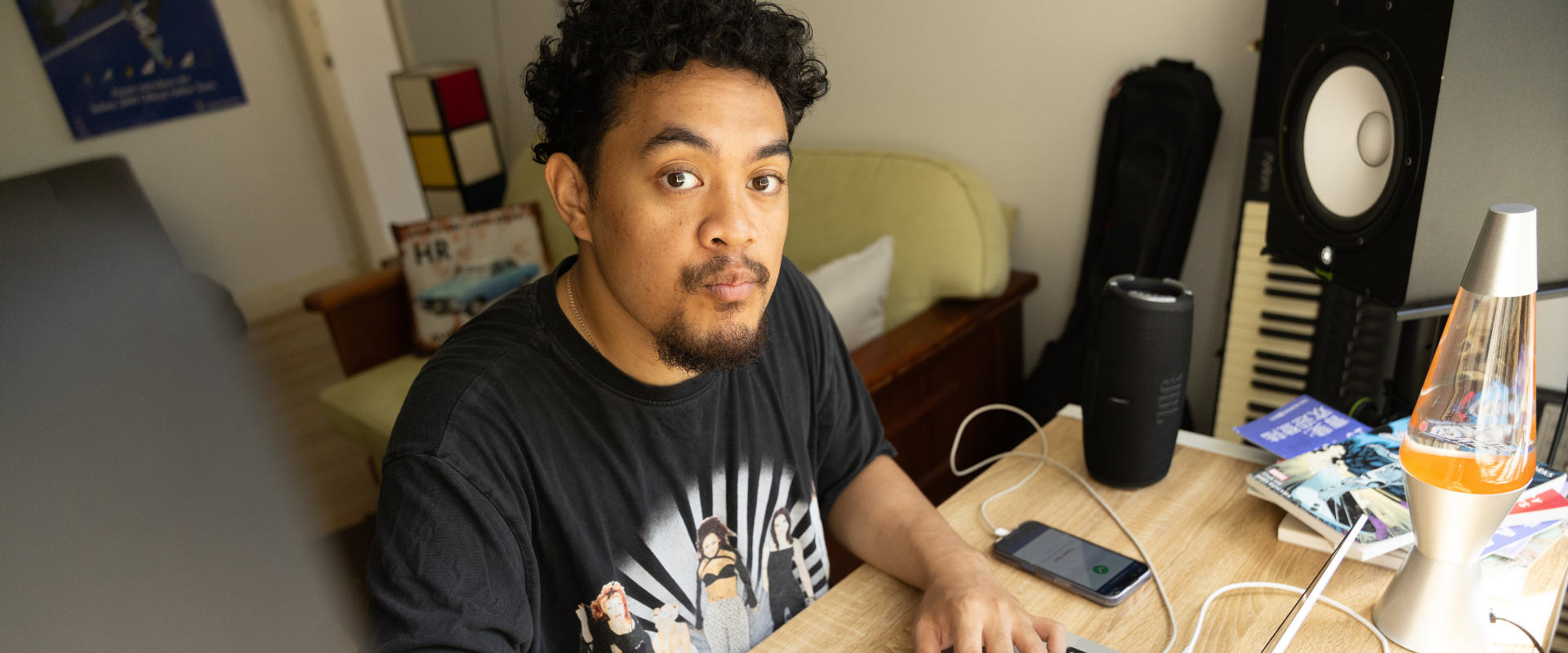 Sollyy producing music in his living room studio. Image: Brendan Blacklock/City of Sydney