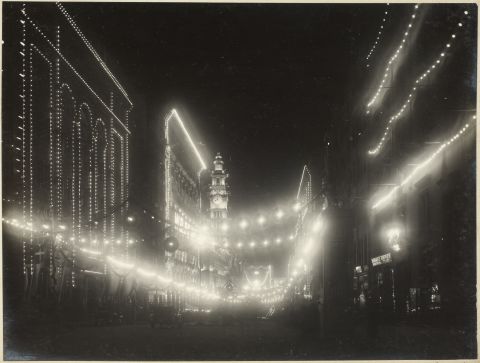 A night view of illuminations along Martin Place for the visit of the Prince of Wales, 1920. City of Sydney Archives A-00040168