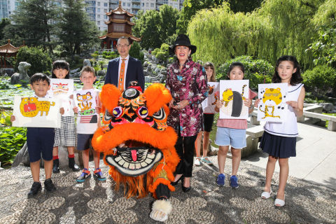 Councillor Robert Kok and Lord Mayor Clover Moore alongside young artists presenting their winning Year of the Tiger artworks