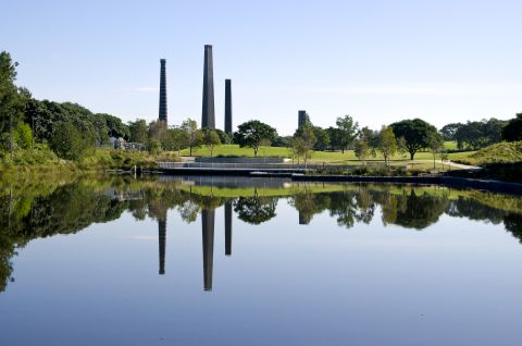 The chimney stacks and wetlands in Sydney Park.