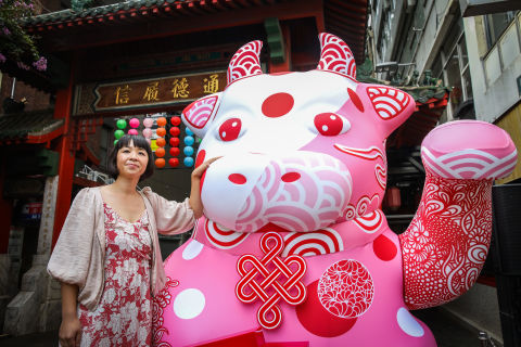Chrssy Lau hopes people will give the ox a hug, touch the waving arms and enjoy the patterns