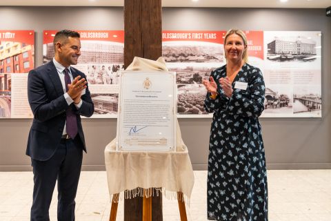 Alex Greenwich MP and Emma Rigney, City of Sydney acting CEO, unveil a plaque commending the Goldsbrough Mort&#39;s efforts to transition to clean energy. Photo: Nick Langley.