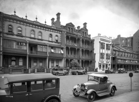 Terraced housing opposite Sydney Hospital, Macquarie Street, Sydney, 1933 (City of Sydney Archives, A-00006473)