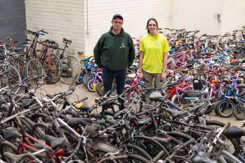 Guido and Sienna from Revolve with just some of the bikes they&#39;ve collected in May 2023 alone. Across a year, they&#39;ll collect, recycle or redeploy between 4000-5000 bikes. Photo: Chris Southwood / City of Sydney