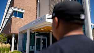 A US veteran walks into the Lane Center to meet with his therapist.