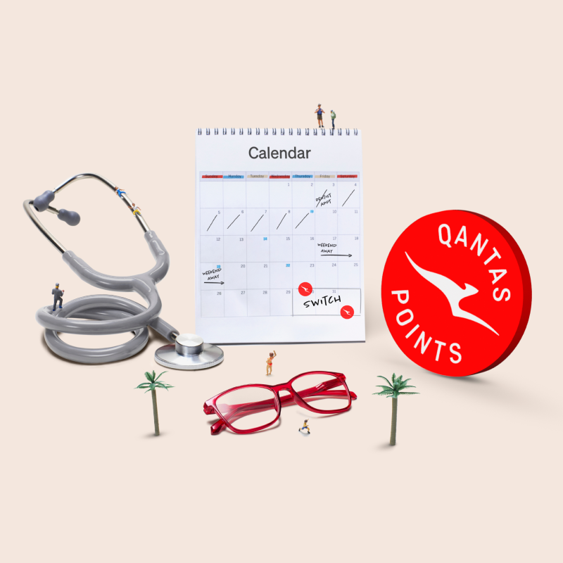 Qantas Health Insurance campaign artwork featuring a silver stethoscope, an eye chart, red eyeglasses, and an open circle with Qantas points written alongside miniature figures, visually representing comprehensive medical, extras, and travel rewards.