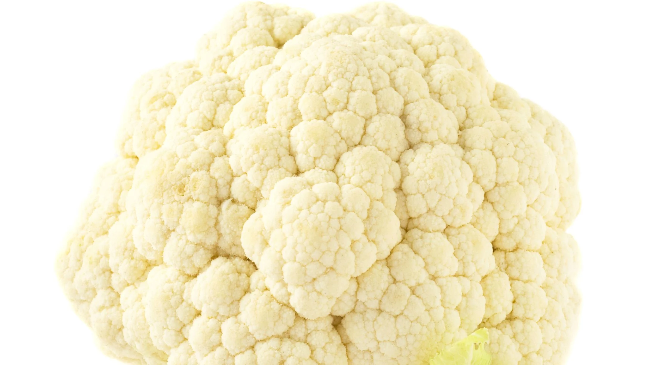 A fresh whole head of cauliflower with creamy white florets, isolated on a white background.