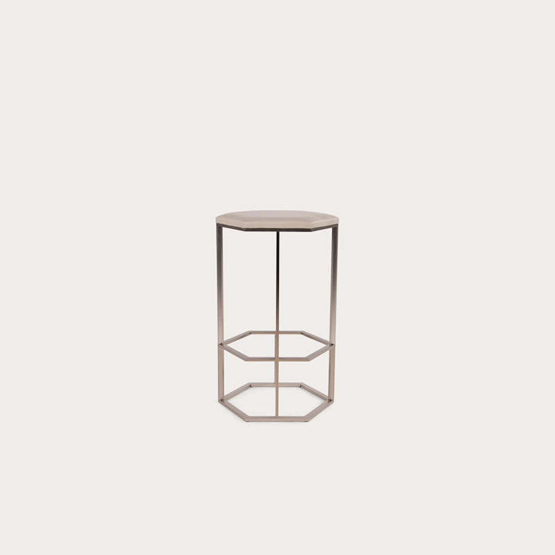 In studio photograph of Rue Saint-Honoré Counter Stool