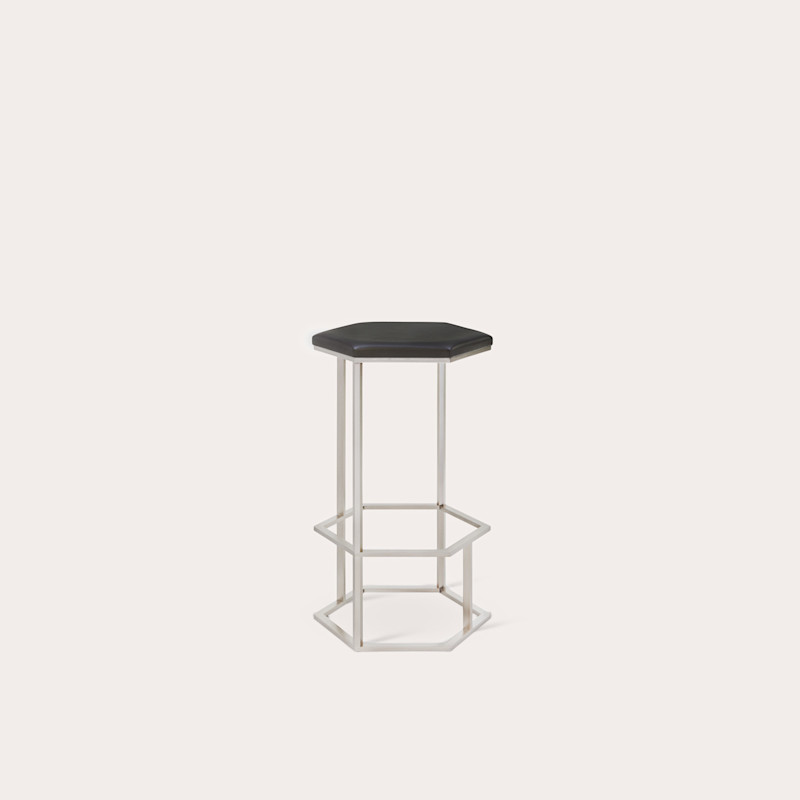 In studio photograph of Rue Saint-Honoré Counter Stool