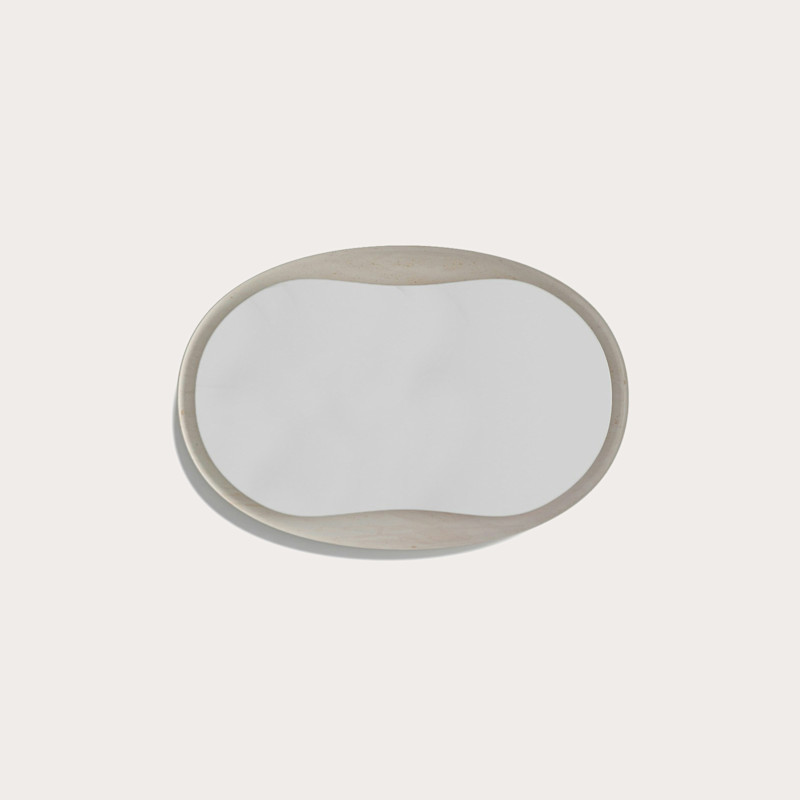 In studio photograph of Anima Mirror Oval