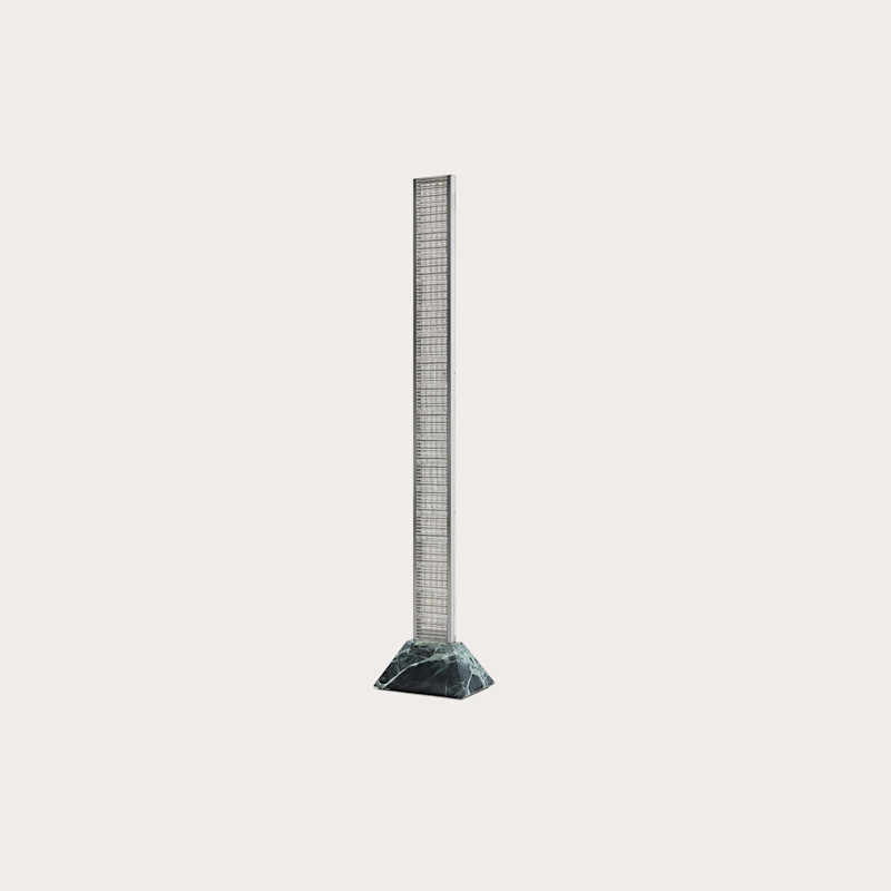 In studio photograph of Sistema Totem Floor Lamp