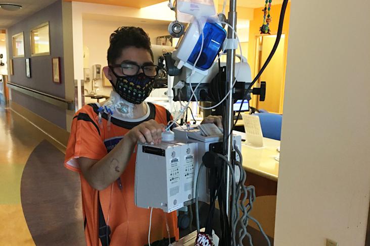 Starlight kid Luke in the hospital hooked up to a respirator