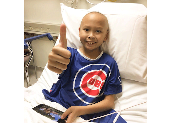 STARLIGHT KID, KYRELL, APPROVES OF HIS COOL CHICAGO CUBS-THEMED STARLIGHT GOWN