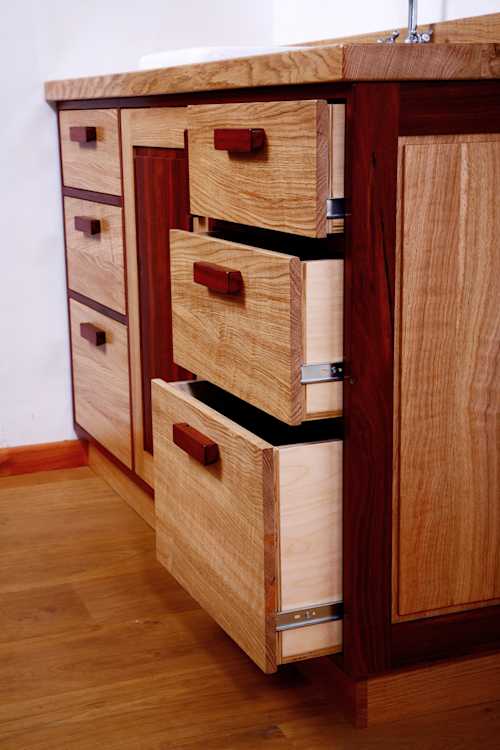 Drawers in an Oak and Purple Heart cabinet Drawers in an Oak and Purple Heart cabinet