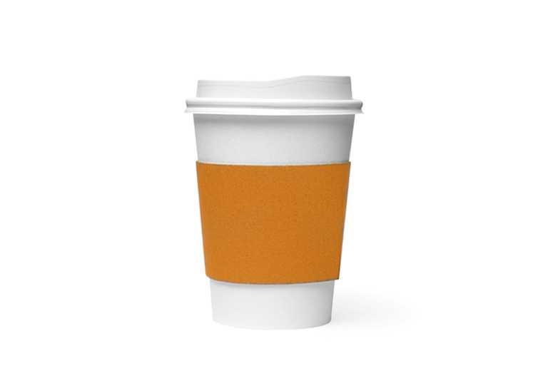 Coffee cup with an orange sleeve.