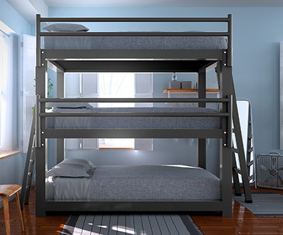 A charcoal Full XL Triple Bunk Bed in a hostel
