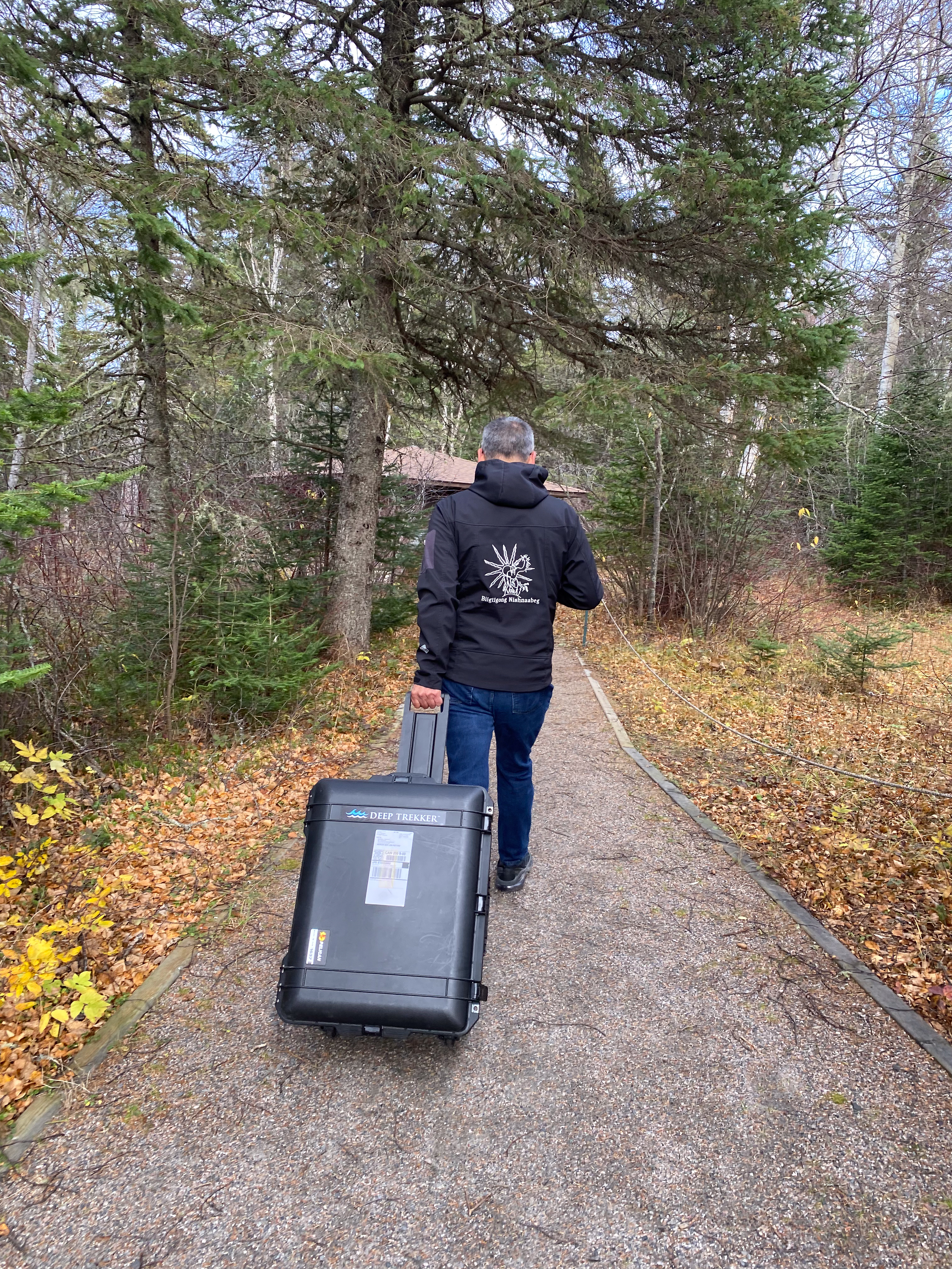 Biigtigong Nishnaabeg - walking with case