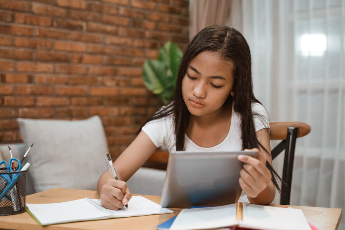 girl-writing-in-notebook