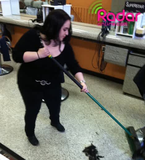 Nikki Blonsky sweeping the floor