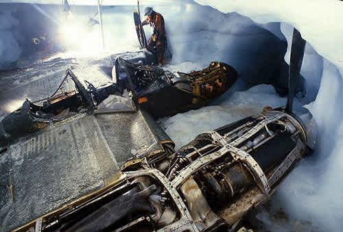 Greenland expedition team rescuing Glacier girl