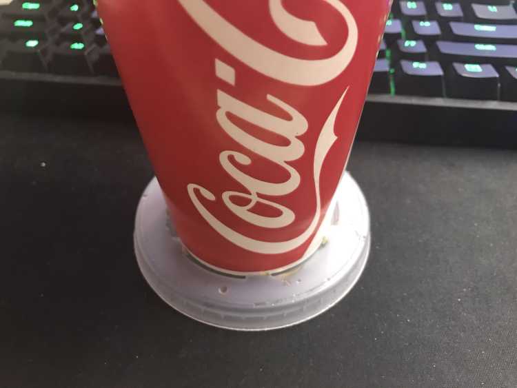 fast food beverage cup lid doubles as a perfect coaster