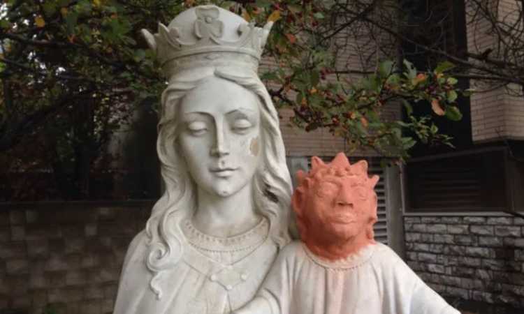 A Holy Decapitation Baby Jesus statue failed art restoration