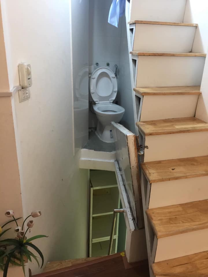 hidden stairs toilet