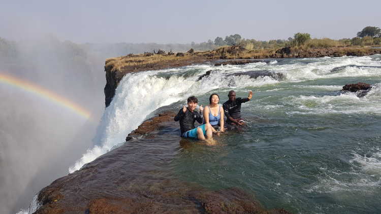 Visitors at the Devil-s Pool, Victoria Falls