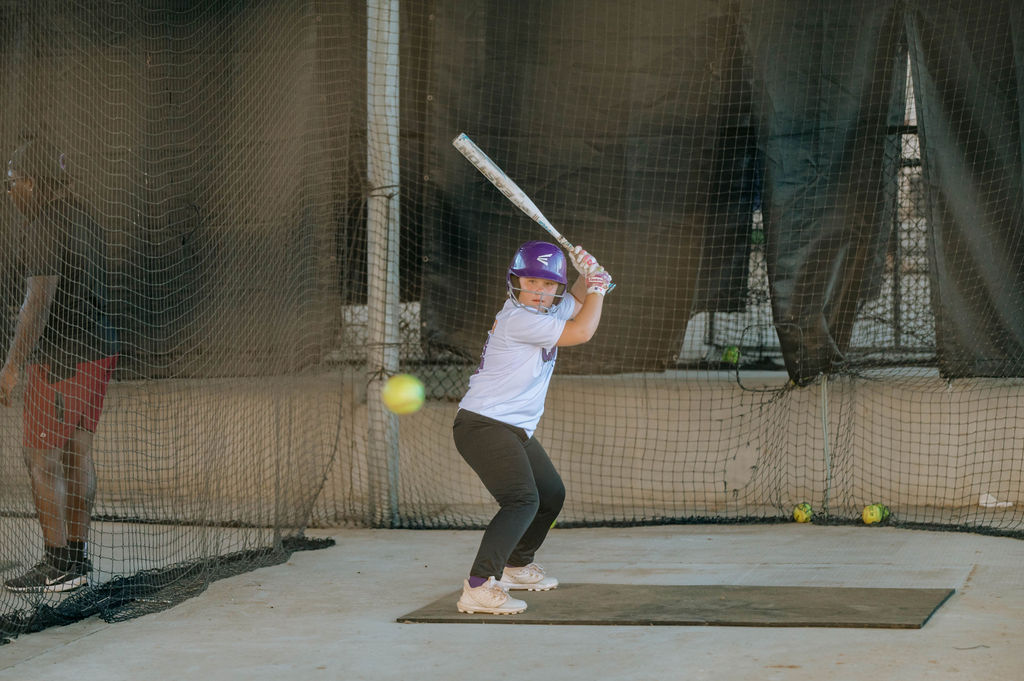 Chaos girl hitting in the cage
