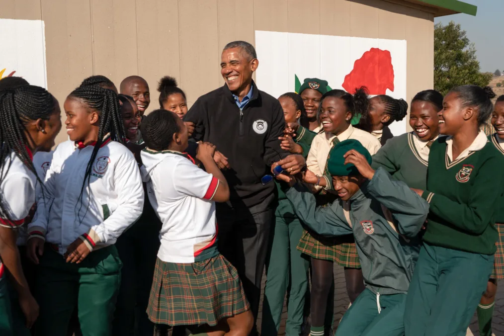 President Obama plays with school children during a service project in Johannesburg.