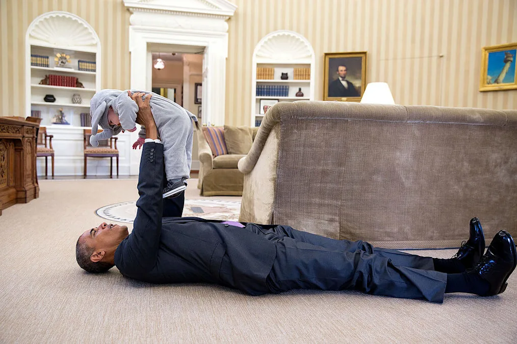 The President lifted Ella Rhodes in her elephant costume that she was wearing for a Halloween event at the White House.