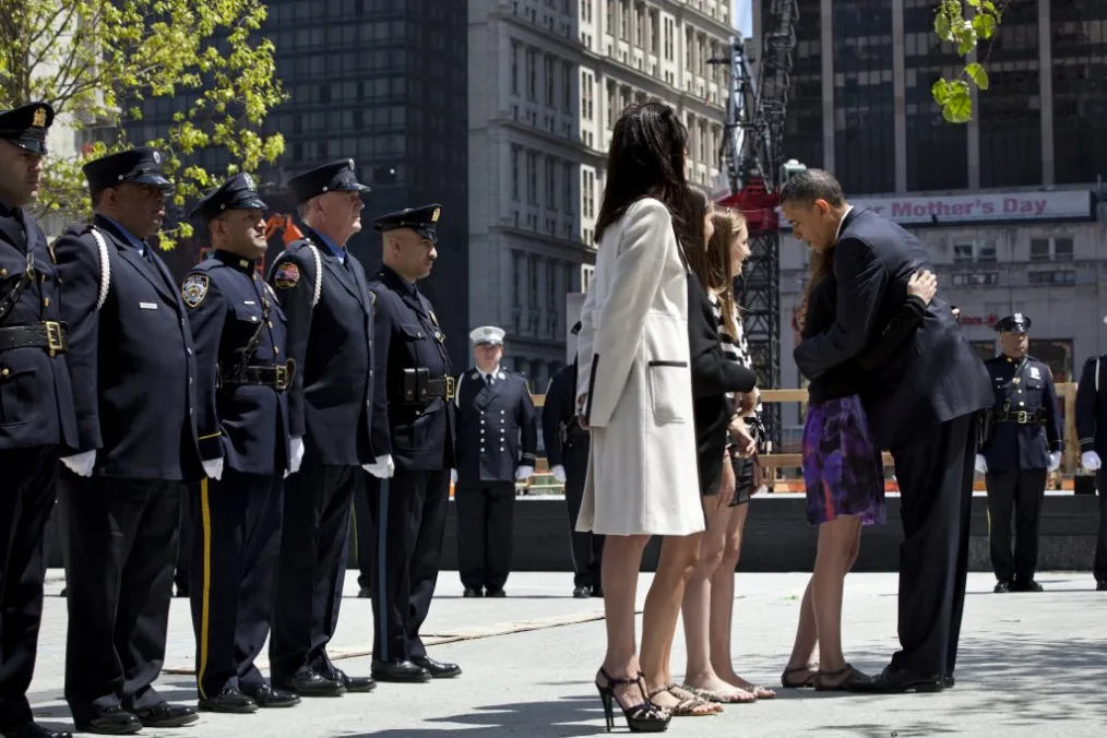 President Obama hugs a young woman at New York City's Ground Zero.