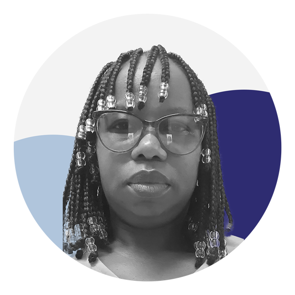 A Black woman with braided hair adorned with beads is facing the camera with a straight expression. She is wearing dark framed glasses. The photo is black and white and features two circles, one which is light blue and the other dark blue. 