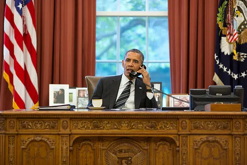 President Barack Obama talks with President Hassan Rouhani