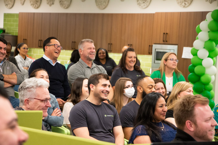 Invitation Homes employees sitting down in the family room