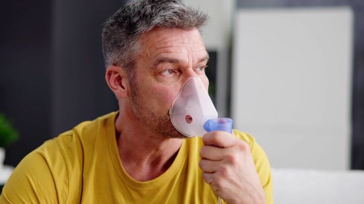 Asthma Patient Breathing Using Oxygen Mask 