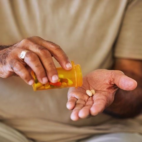 medicine, healthcare and pills in the hands