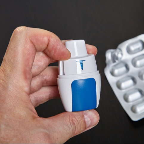 Inhaler for powder inhalation from asthma attacks