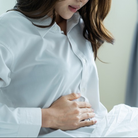 Woman Experiencing Lower Right Abdominal Pain in the Morning