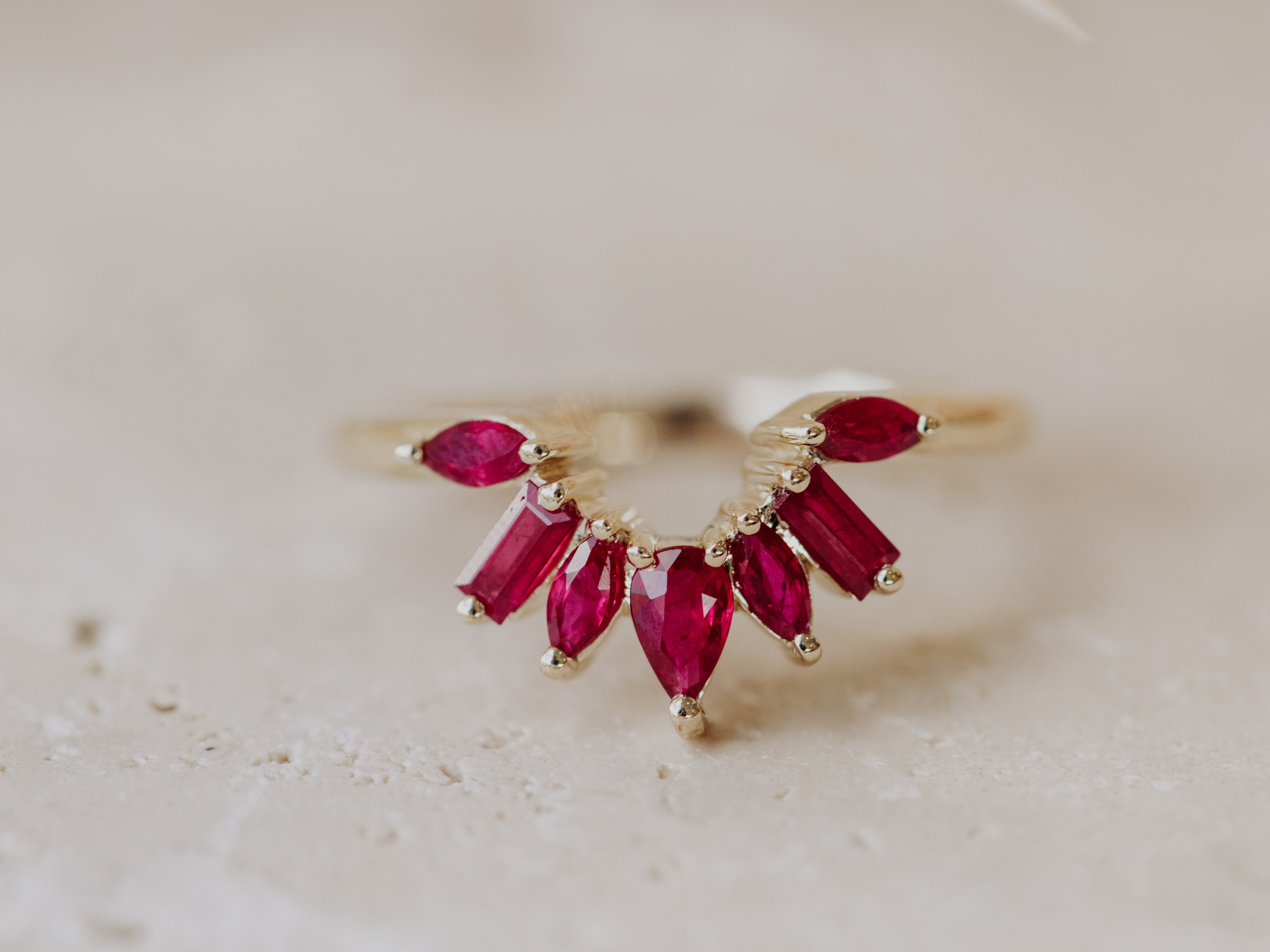 The Flora Ruby Band in 14k yellow gold.
