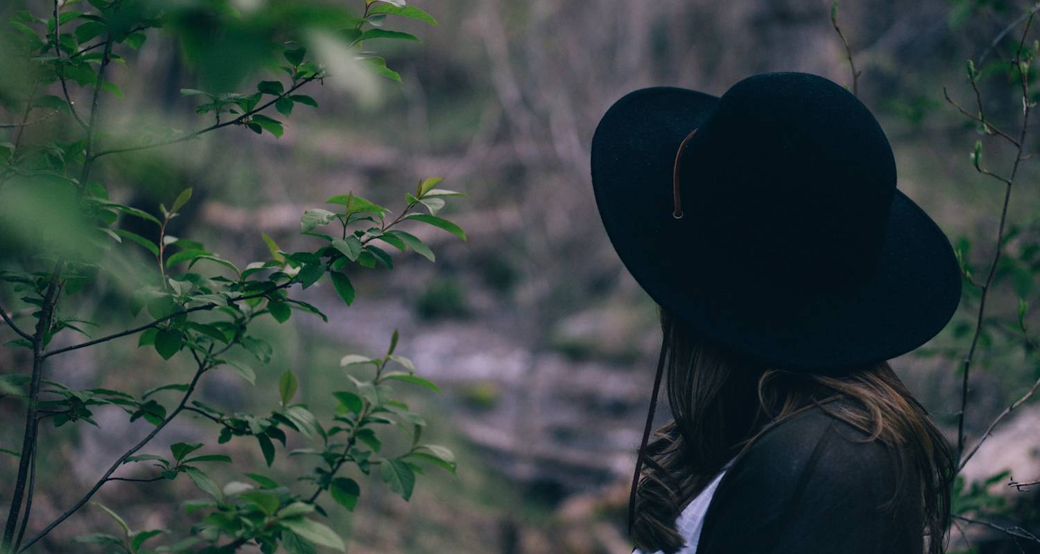 Woman wearing a black hat