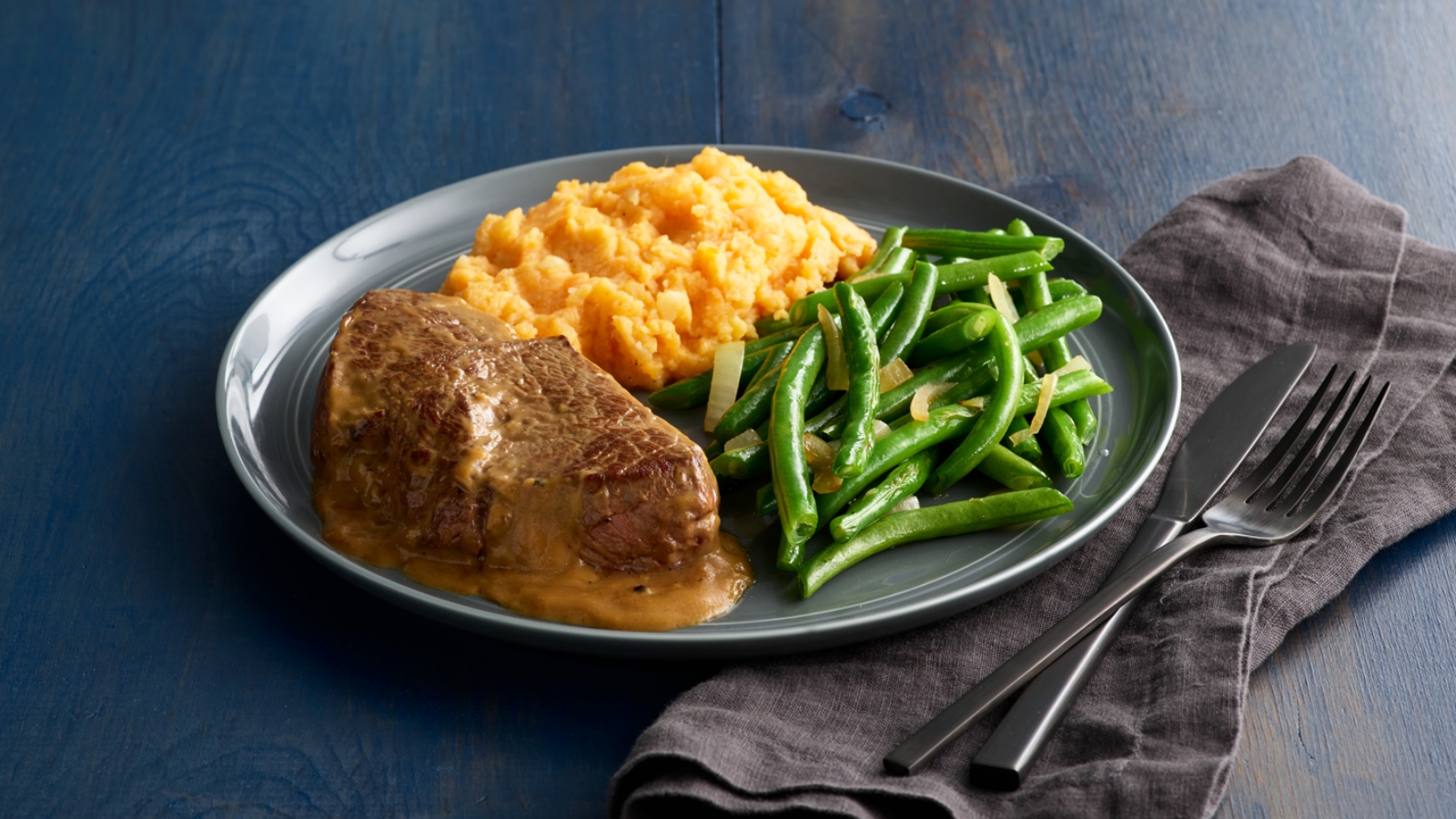 Bourbon Peppercorn Steak with Mashed Sweet Potatoes & Green Beans