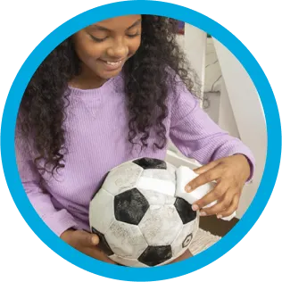 Mr. Clean wipe cleaning dirty from sport equipment