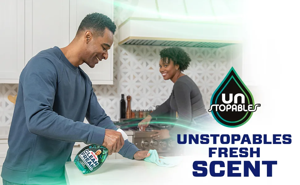 People cleaning a kitchen with a Mr. Clean CleanFreak Mist Unstopables Fresh Scent