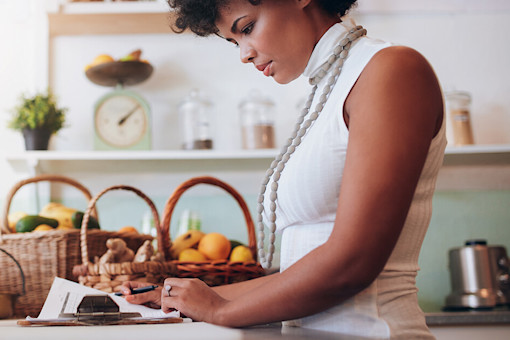 Business woman owner doing accounts