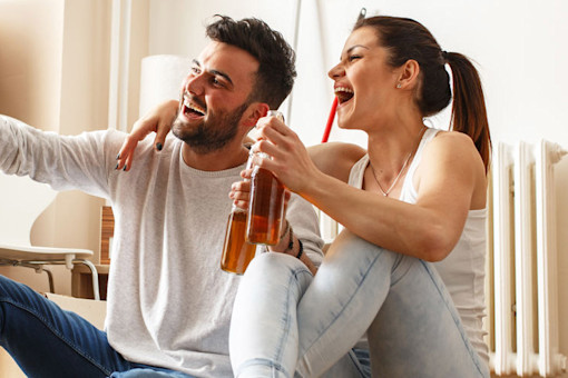 Couple taking selfie in new home