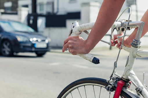 Young woman cyclist in the city