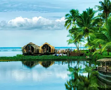 Experience the serene Kerala backwaters with TravelTaxi's guided houseboat tours in Alleppey.