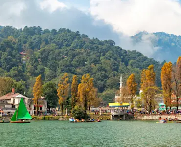 Indulge in Nainital's culinary delights with TravelTaxi - The flavorful Kumaoni cuisine.