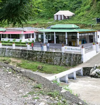 Enjoy panoramic vistas at Tip N Top viewpoint with TravelTaxi's scenic tours in Lansdowne, Uttarakhand.